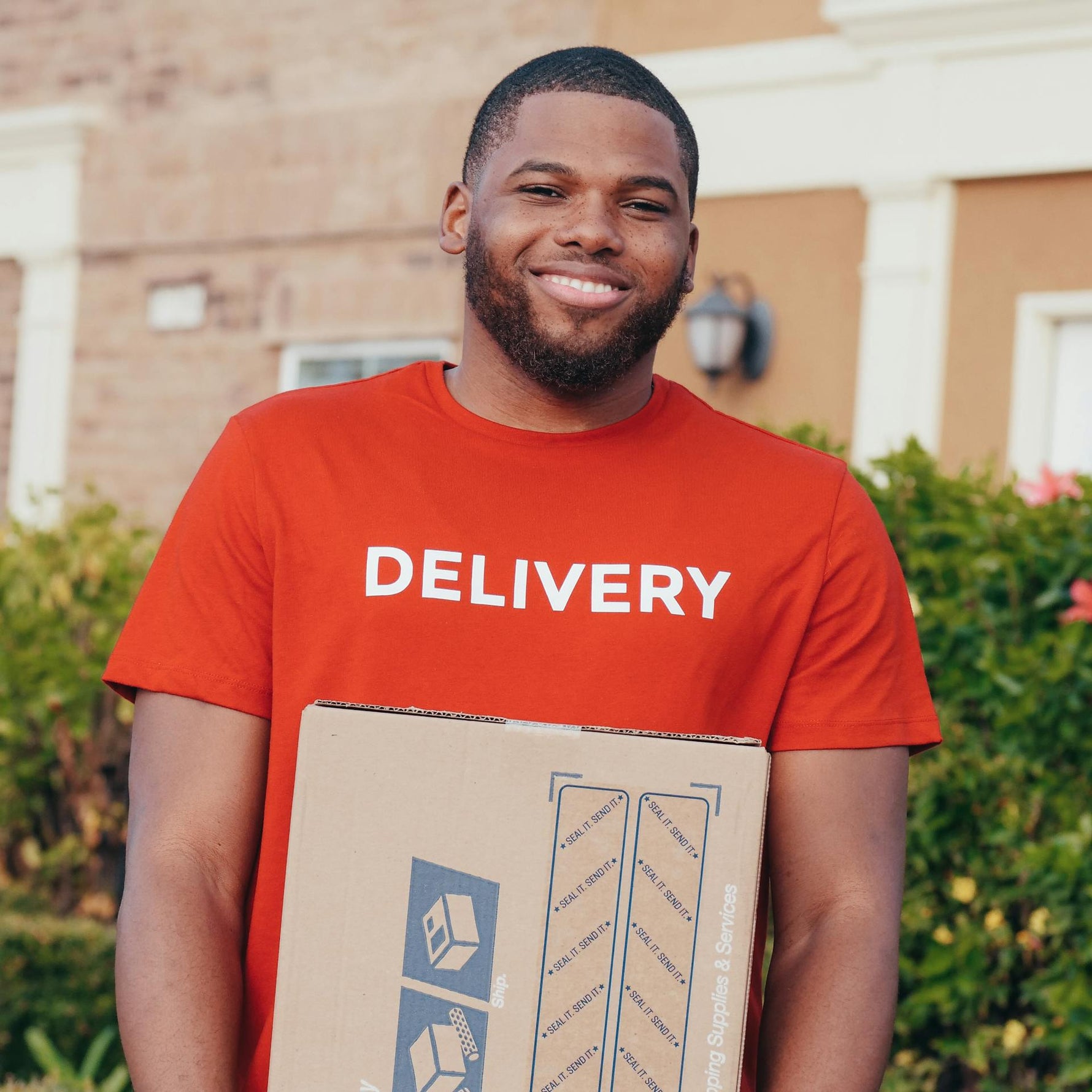 Man fulfilling free delivery of mattress and base